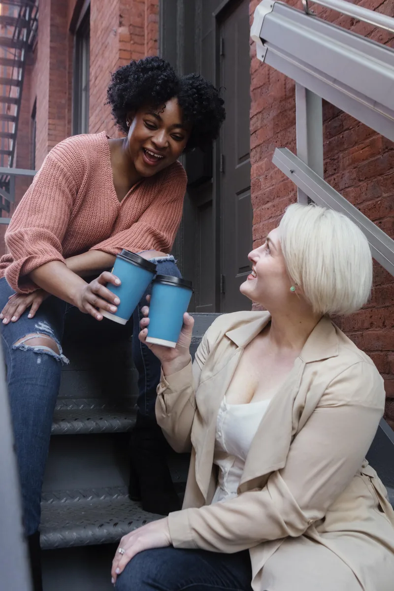 Friends laughing together outdoors